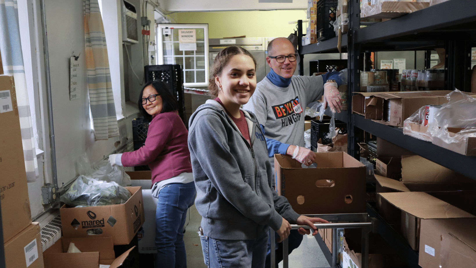 volunteers in pantry