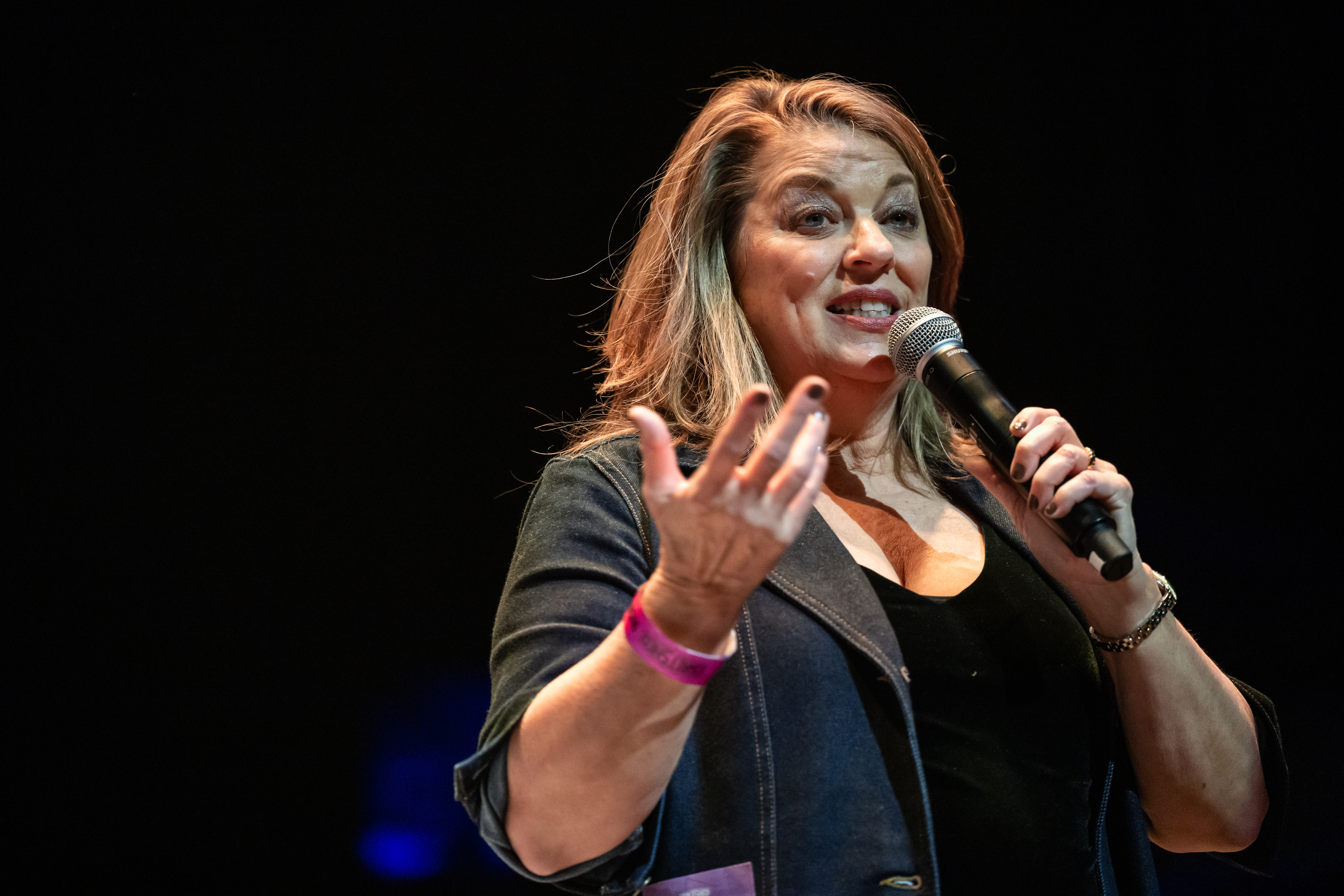 Michele Zurakowski at the microphone