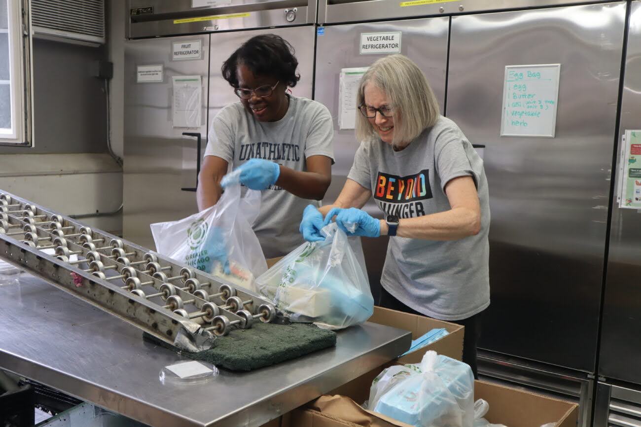 Go Beyond Hunger Volunteers Packing Food