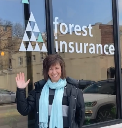Teri in front of Forest Insurance