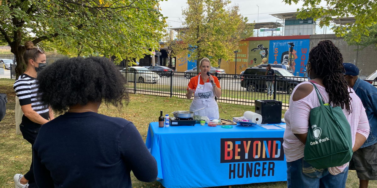 Maria running a cooking demo