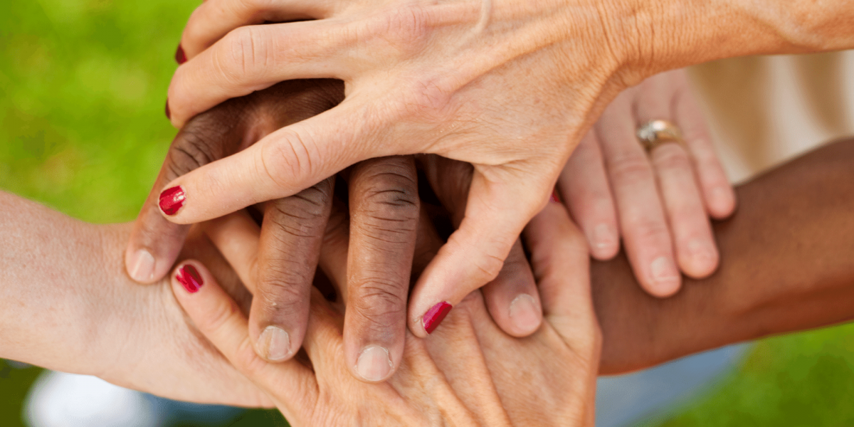 Hands grouped outside