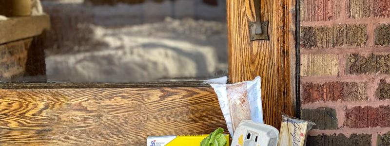 box of food by door. 