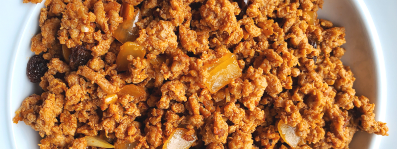 Beef Picadillo Recipe Photo. Image of beef picadillo on a white plate, with a white background.