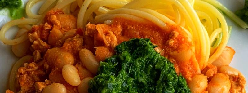 Slow-Cooked Chili Chicken Over Noodles  with an Eat-Your-Greens Salsa