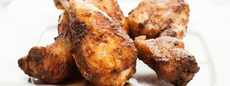 Apple Honey Chicken Drumsticks on white plate