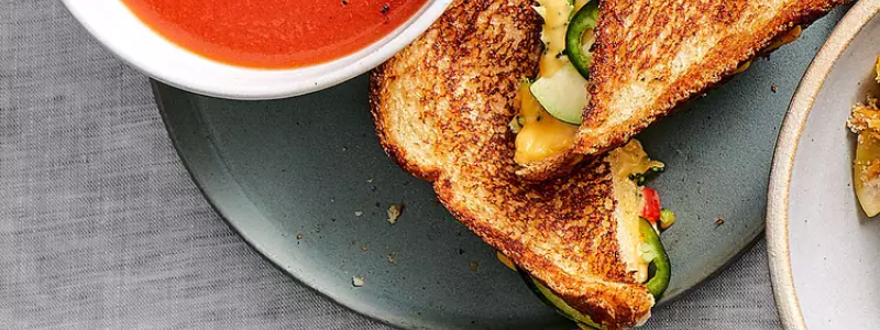 Tomato and red pepper soup and veggie grilled cheese