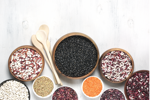 Photo for Dried Beans Information Sheet and Recipe. Various bowls of dried beans against a white background.