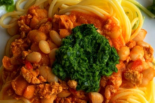 Slow-Cooked Chili Chicken Over Noodles  with an Eat-Your-Greens Salsa