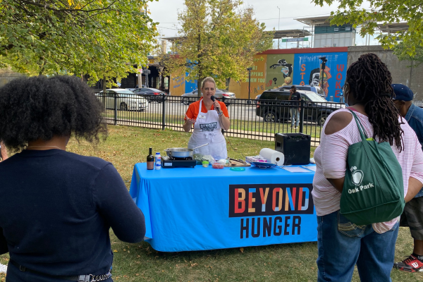 Maria running a cooking demo